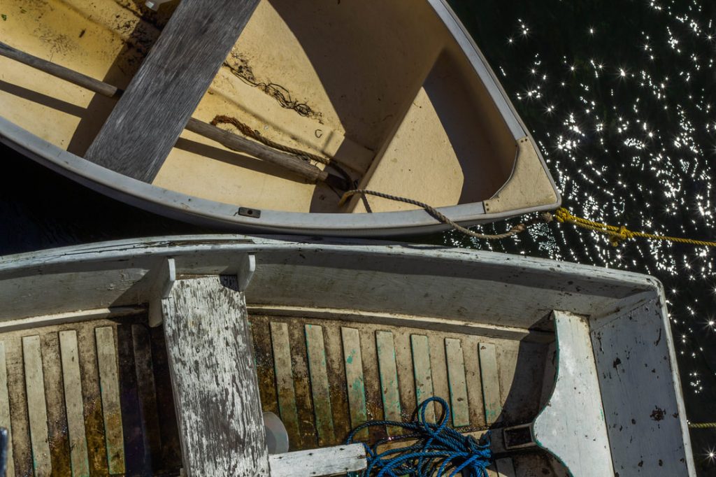 Digital photograph "Together" by Hannah Wynn. Depicts two boats drifting into each other from opposite directions.